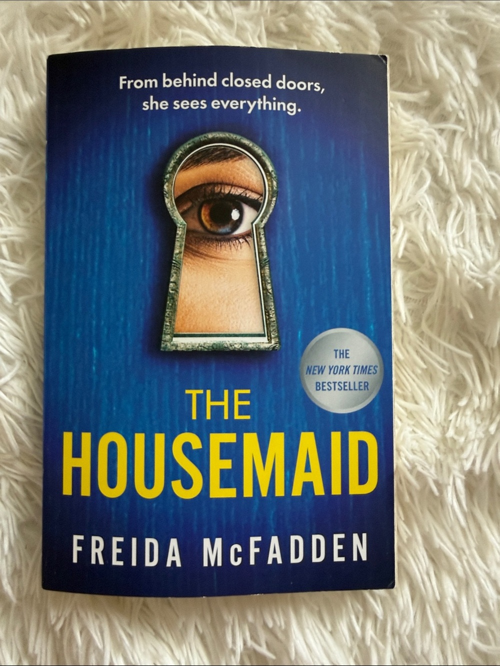 The Housemaid by Freida McFadden - Blue & Yellow Paperback Thriller